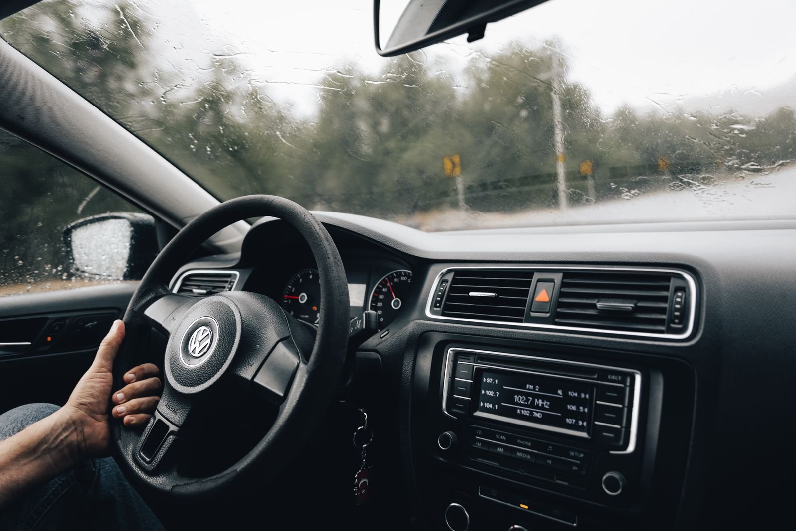 View through a car windscreen during rainy weather