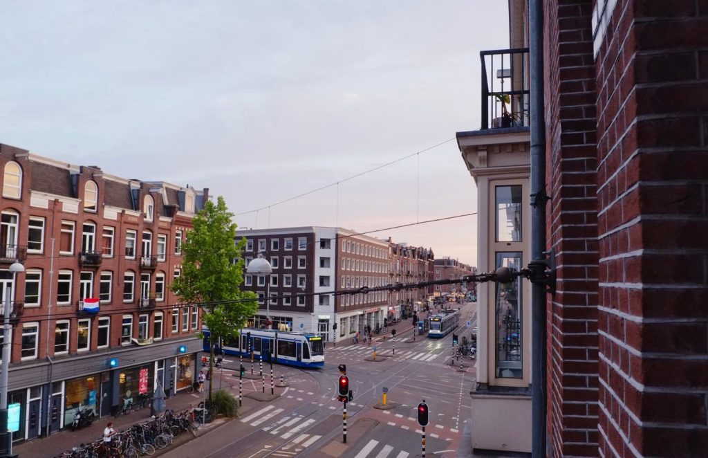 Amsterdam street with a tram and bicycles